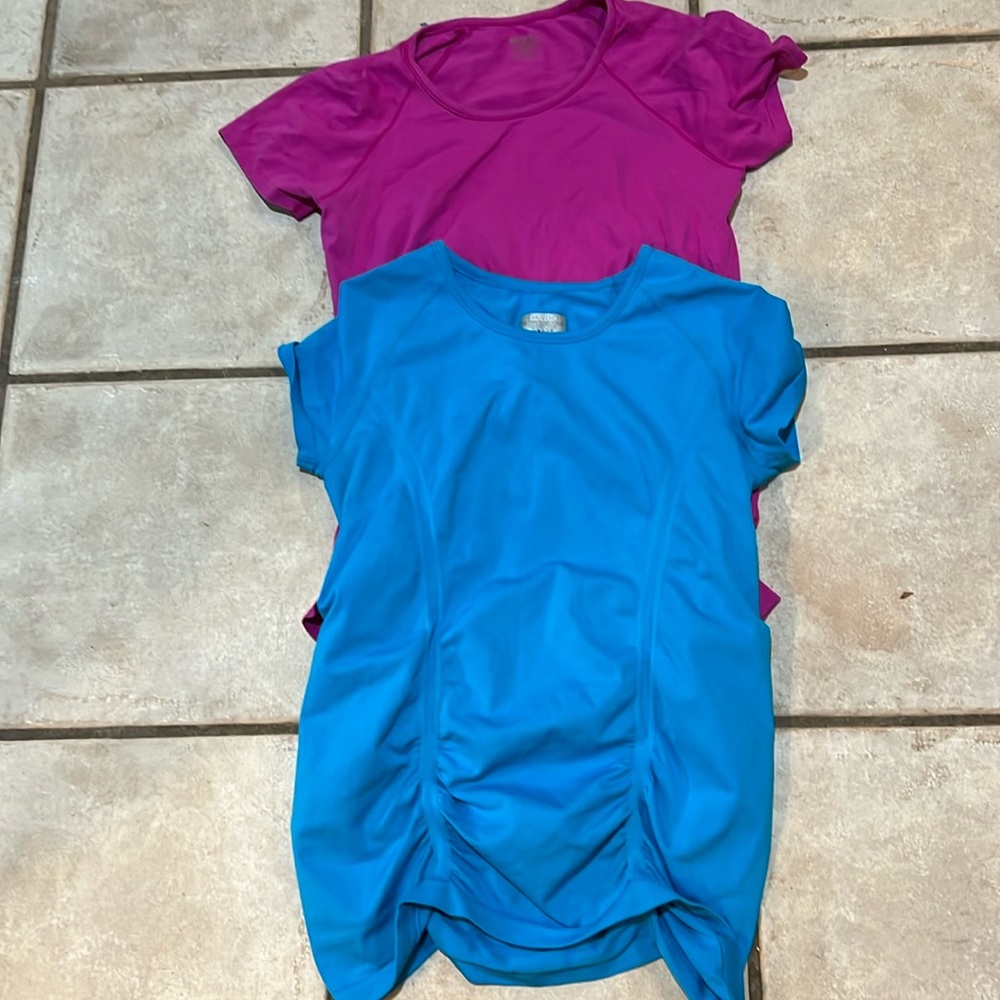 Women’s Athleta size large athletic tops.  Sold together.